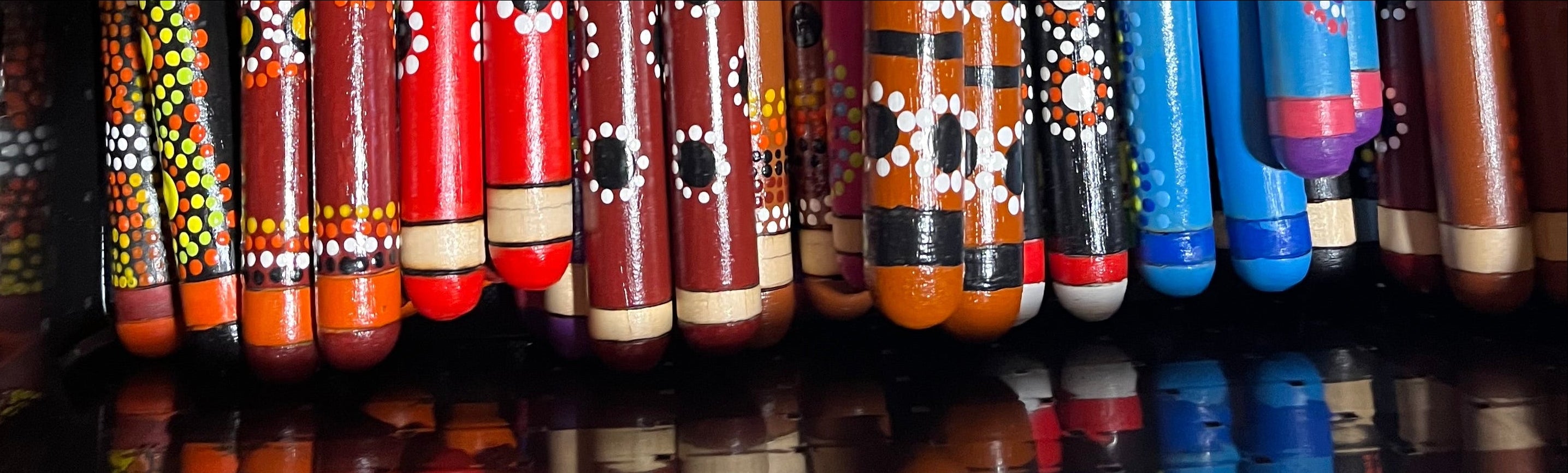 50 hand-painted clapsticks for kids and tourists by AuntBron c.2024